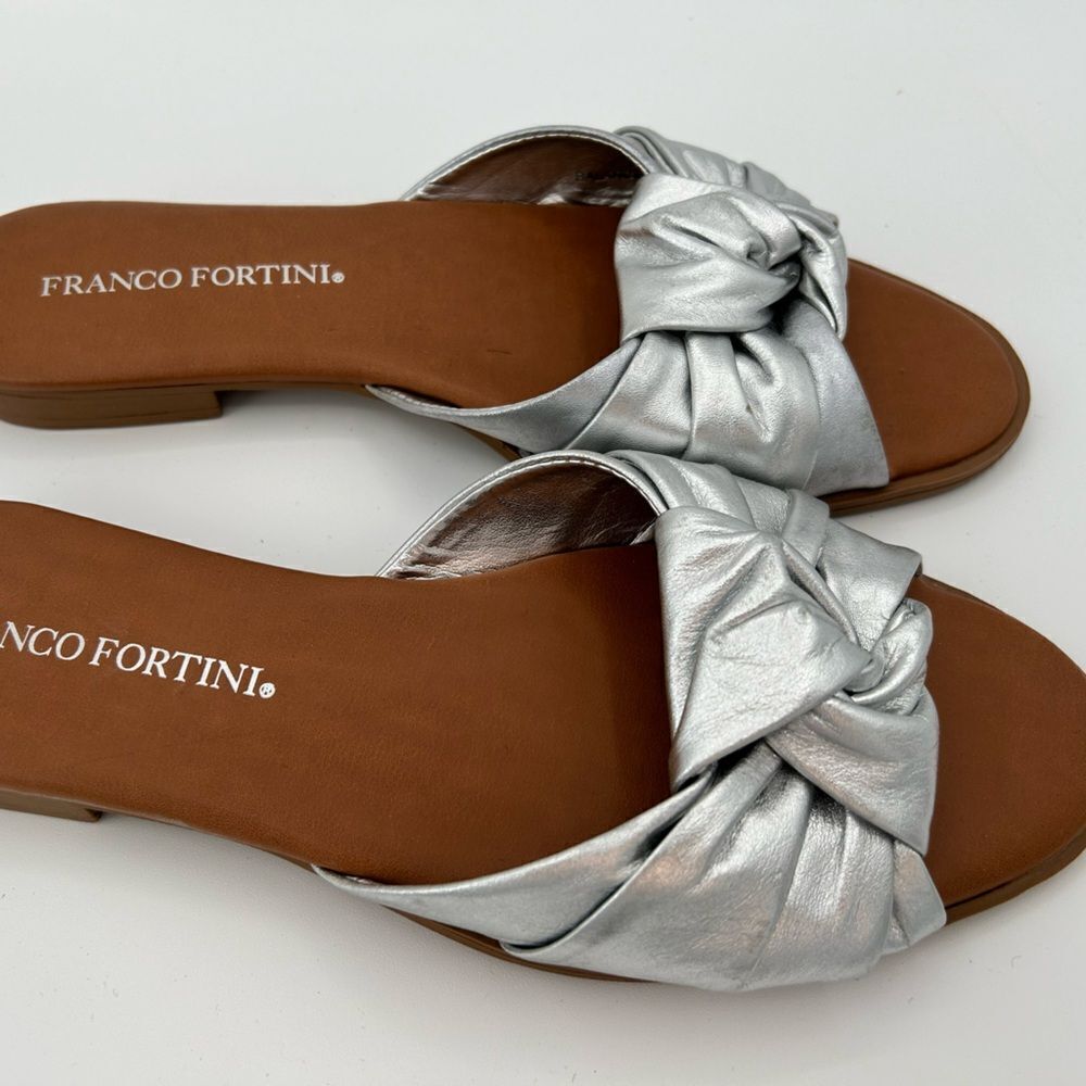 Franco Fortini silver flats, size 8